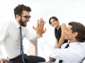 Business colleagues giving each other high five. Royalty Free Stock Photo