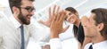 Business colleagues giving each other high five. Royalty Free Stock Photo