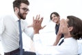 Business colleagues giving each other high five. Royalty Free Stock Photo