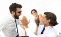 Business colleagues giving each other high five. Royalty Free Stock Photo