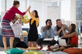 Business colleagues giving high five to each other Royalty Free Stock Photo