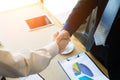 Business colleagues handshake. Businesspeople shaking hands after a successful meeting. Business concept.