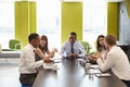 Business colleagues having an informal meeting at work Royalty Free Stock Photo