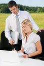 Business colleagues in nature office smile Royalty Free Stock Photo