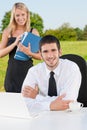 Business colleagues in nature office smile Royalty Free Stock Photo