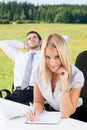 Business colleagues in nature office smile Royalty Free Stock Photo