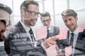 Business colleagues reading sticky notes on glass Royalty Free Stock Photo