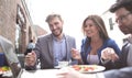 Business colleagues sitting at a table in a cafe Royalty Free Stock Photo