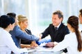 Business colleagues sitting at a table during Royalty Free Stock Photo