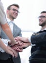 Business colleagues with their hands stacked together Royalty Free Stock Photo