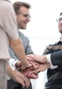 Business colleagues with their hands stacked together Royalty Free Stock Photo