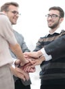 Business colleagues with their hands stacked together Royalty Free Stock Photo