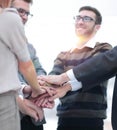 Business colleagues with their hands stacked together Royalty Free Stock Photo