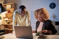 Business colleagues working till late at office Royalty Free Stock Photo