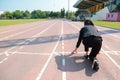 Business competition: businesswoman on start line and ready to reach the target Royalty Free Stock Photo