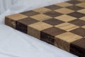 Business competition chess board concept in grainy faded old time look.