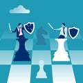 Business competition concept. Two businessmen at chess figures fight in battle.