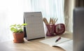 Business computer office desk with desktop laptop, Calendar, notebook, schedule and agenda book place on wooden table, working Royalty Free Stock Photo