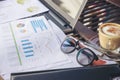 Business computer office desk with desktop laptop, notebook, pen and annual, summary report place on wooden table, working space Royalty Free Stock Photo