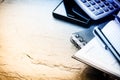 Business concept with agenda, mobile phone and calculator Royalty Free Stock Photo