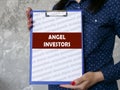 Business concept about ANGEL INVESTORS with sign on the page