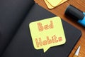 Business concept about Bad Habits with inscription on the piece of paper Royalty Free Stock Photo