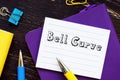 Business concept about Bell Curve with sign on the piece of paper