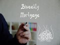 Business concept about Biweekly Mortgage with sign on the piece of paper