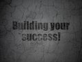 Business concept: Building your Success! on grunge wall background