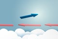 Business concept.Blue arrow leader flying on blue sky of business teamwork and one different vision from red arrows