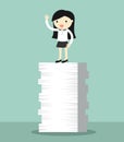 Business concept, Business woman is standing on the tops of papers.