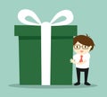 Business concept, Businessman holding a big gift box for Christmas festival. Royalty Free Stock Photo