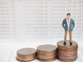 Business Concept. businessman small figures standing on calcula Royalty Free Stock Photo