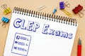 Business concept about CLEP Exams with inscription on the sheet Royalty Free Stock Photo