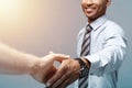 Business concept - Close-up of two confident business people shaking hands during a meeting. Royalty Free Stock Photo