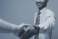 Business concept - Close-up of two confident business people shaking hands during a meeting. Royalty Free Stock Photo