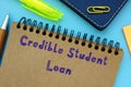 Business concept about Credible Student Loan with sign on the page