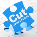 Business concept: Cut Your losses on puzzle background