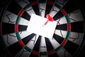 Business concept. darts arrows in the target center with paper note for Writing goals for this business year Royalty Free Stock Photo