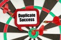 On the darts are darts and a sign with the inscription - Duplicate Success