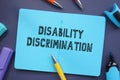 Business concept about Disability Discrimination with phrase on the sheet