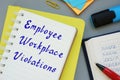 Business concept about Employee Workplace Violations with phrase on the piece of paper