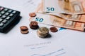 Coins stacks downtrend and the dices cube with the word SELL on financial chart. Selective focus Royalty Free Stock Photo