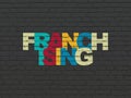 Business concept: Franchising on wall background Royalty Free Stock Photo