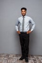 Business Concept - Full length portrait of confident african american businessman in the office. Royalty Free Stock Photo