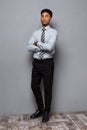 Business Concept - Full length portrait of confident african american businessman in the office. Royalty Free Stock Photo