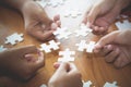 Business concept, Group of business people assembling jigsaw puzzle and represent team support and help togethe Royalty Free Stock Photo