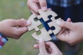 Business concept, Group of business people assembling jigsaw puzzle and represent team support and help togethe Royalty Free Stock Photo