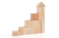 Business concept growth success process. Wooden blocks stacking as an arrow up averages as a growth graph chart Royalty Free Stock Photo