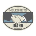 Business concept with handshake and the text Welcome to Idaho, U